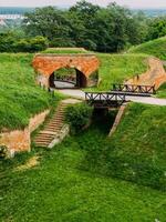 Park with green hills and historical architecture at the Petrovaradin Fortress photo