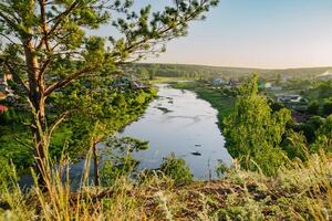 Sunny Village River and Suspended Bridge photo