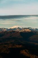 Mount Akhun tower offers stunning views of mountains and autumn landscape. photo