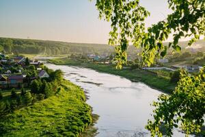 Sunny Village River and Suspended Bridge photo