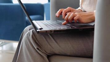 Close up of young business girl working with laptop in coffee shop cafe video