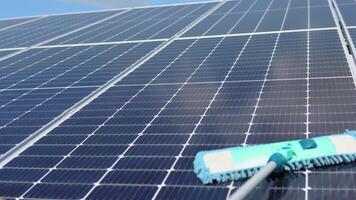 Cleaning solar panel in solar power plant video