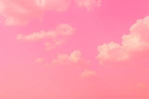 Pink sky clouds background, pastel sky background photo