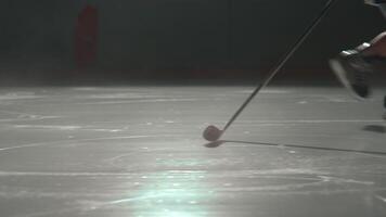 Hockey Player Skillfully Maneuvering Checker on Ice video