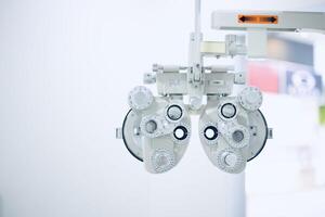 Phoropter eye test in hospital, Eye measurement equipment for patients in hospitals photo