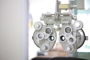 Phoropter eye test in hospital, Eye measurement equipment for patients in hospitals photo