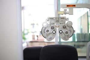 Phoropter eye test in hospital, Eye measurement equipment for patients in hospitals photo