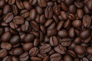 Roasted coffee beans background, brown coffee background photo