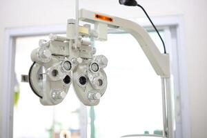 Phoropter eye test in hospital, Eye measurement equipment for patients in hospitals photo