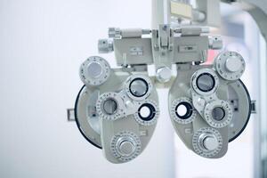 Phoropter eye test in hospital, Eye measurement equipment for patients in hospitals photo