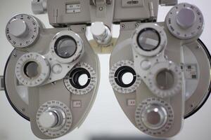 Phoropter eye test in hospital, Eye measurement equipment for patients in hospitals photo