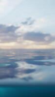 An ethereal seascape blending the ocean and the sky in a mesmerizing blur video