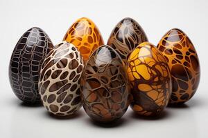 A group of colorful easter eggs sitting next to each other in a neat row. photo