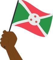 Hand holding and raising the national flag of Burundi vector