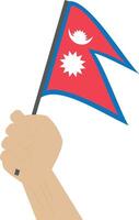 Hand holding and raising the national flag of Nepal vector