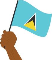 Hand holding and raising the national flag of Saint Lucia vector