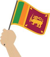 Hand holding and raising the national flag of Sri Lanka vector