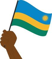 Hand holding and raising the national flag of Rwanda vector