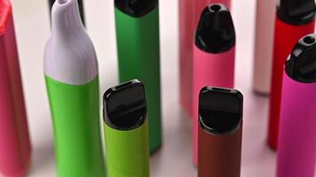 Set Of Colorful Disposable Electronic Cigarettes Of Different Shapes On A White video