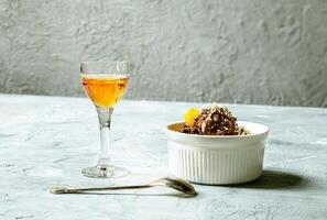 Tangerine liqueur and chocolate mousse photo