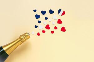 French champagne bottle and hearts photo