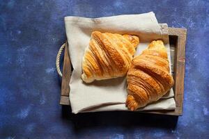 French croissants in a tray photo