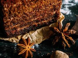 a slice of cake with anise and spices photo