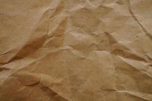 a brown paper texture with some crumpled edges photo