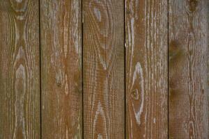 a close up of a wooden fence with a white border photo