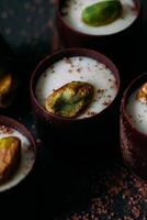 pistachio pudding with chocolate ganache photo