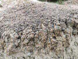 Dry soil texture on a cliff photo