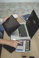 person using digital tablet in office photo