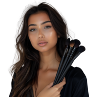 Professional makeup artist holding brushes, portrait shot png