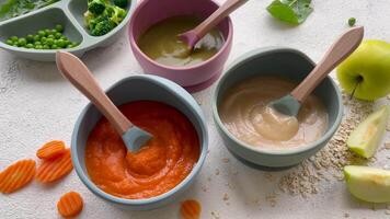 Healthy baby food in bowls. video