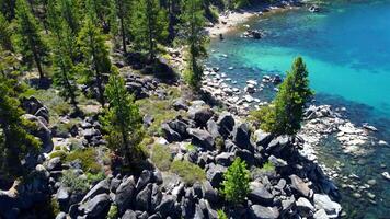 Aerial view nature of a wild lake with crystal clear water located in the high mountains of the Swiss Alps video