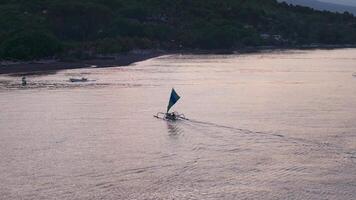 Fishing boat sailing shore background sunset video