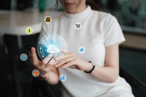 Female using smartphone with icon graphic cloud cyber security network of connected devices and personal data security. photo