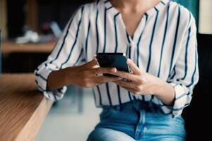 A businesswoman completes KYC using an online banking program in order to open a digital savings account. The definition of cyber security. photo