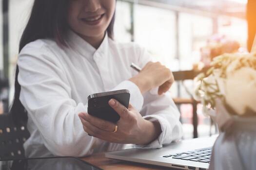 A businesswoman completes KYC using an online banking program in order to open a digital savings account. The definition of cyber security. photo