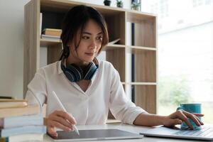 User experience concept. Creative Web Designer sketching application and developing template layout on laptop, framework for digital devices. photo