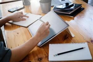 User experience concept. Creative Web Designer sketching application and developing template layout on laptop, framework for digital devices. photo