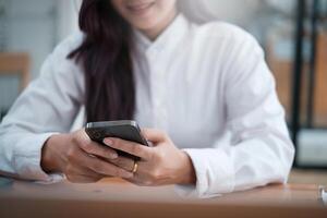 A businesswoman completes KYC using an online banking program in order to open a digital savings account. The definition of cyber security. photo