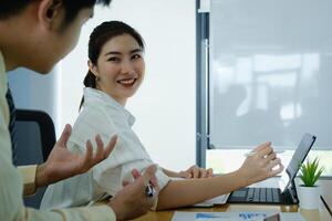 Fund managers team consultation and discuss about analysis Investment stock market by digital tablet. photo