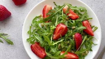 Vitamin salad of strawberry with arugula video