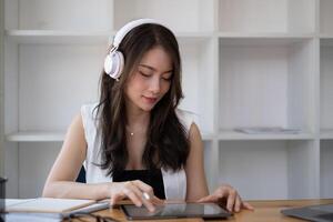 Closeup of female ux developer and ui designer about mobile phone app interface in living room at home.Creative digital development agency concept. photo
