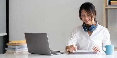 User experience concept. Creative Web Designer sketching application and developing template layout on laptop, framework for digital devices. photo