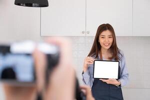 Blogger or Vlogger checking the content before uploading on website. Freelance and modern people concept. photo