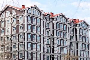 Residential complex in Kyiv in British style. Exterior of a multi-story modern building. photo