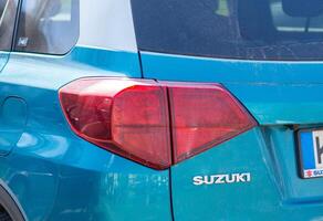 Kyiv, Ukraine. April 6, 2024. Blue Suzuki Vitara, Close up of the car detailing red taillights of SUV. photo