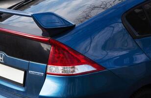 Kyiv. Ukraine. April 2024. Blue Honda close-up tail light with spoiler rear view photo